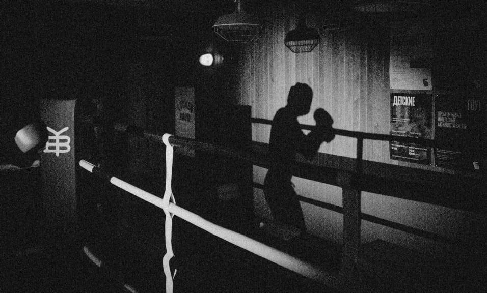 Shadow of boxer in boxing ring